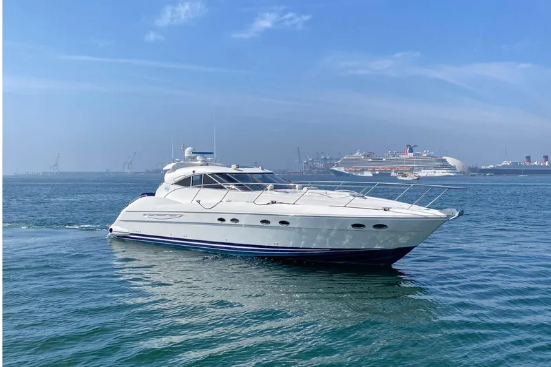 The Image of 2000 Neptunus 56 Express yacht on calm blue waters under a clear sky. - 1