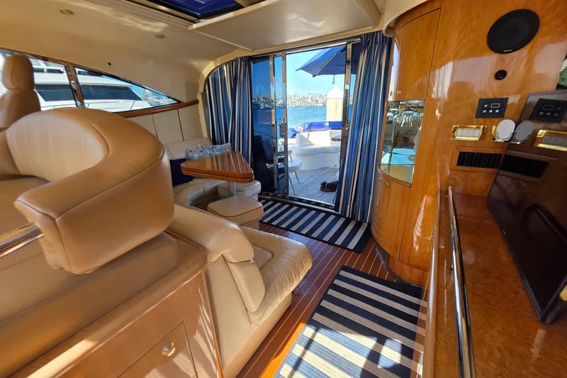 Slide: The Image of Luxurious interior of 2000 Neptunus 56 Express yacht with leather seating and wood finishes. - 10