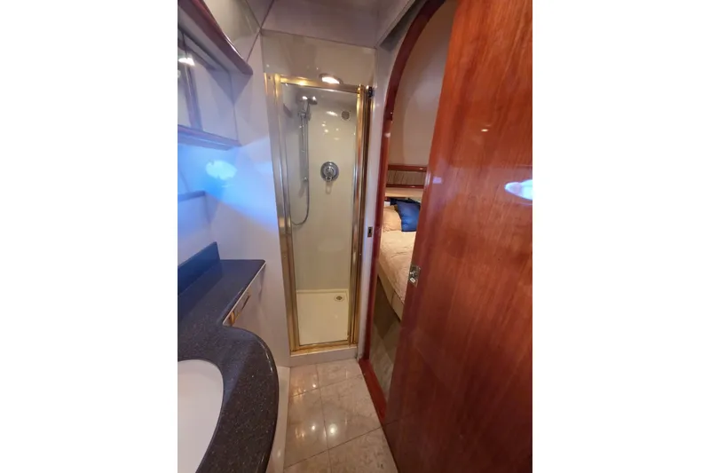 Slide: The Image of Luxurious bathroom interior of 2000 Neptunus 56 Express yacht with shower and vanity. - 12