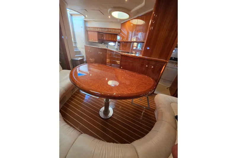 Slide: The Image of Luxurious interior of 2000 Neptunus 56 Express yacht with polished wood finishes. - 29