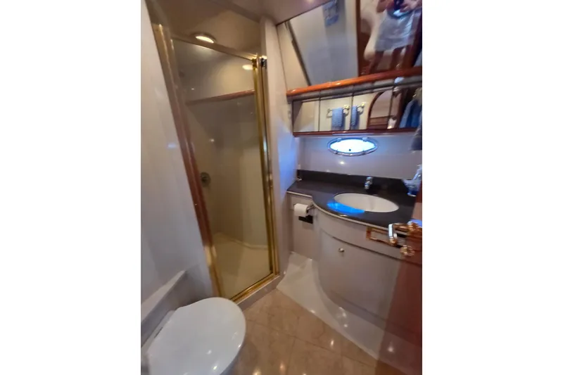 Slide: The Image of Luxurious bathroom in 2000 Neptunus 56 Express yacht with shower and vanity. - 3