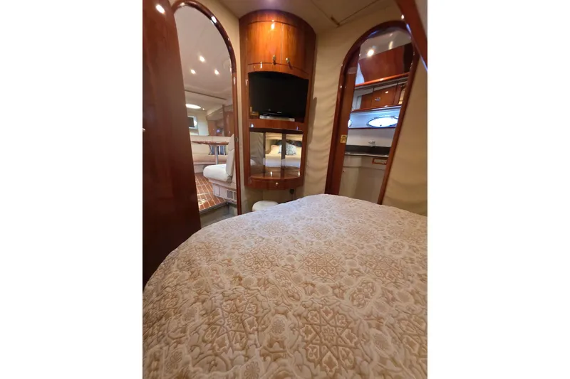 Slide: The Image of Luxurious interior of 2000 Neptunus 56 Express yacht with elegant wood finishes. - 30