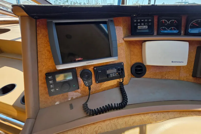 Slide: The Image of Control panel of a 2000 Neptunus 56 Express yacht with navigation equipment. - 31