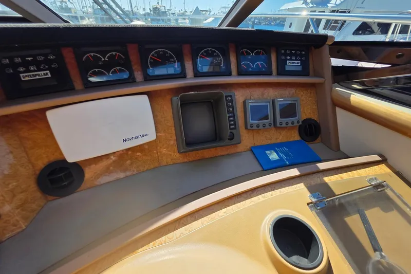 Slide: The Image of Control panel of a 2000 Neptunus 56 Express yacht with navigation instruments. - 6