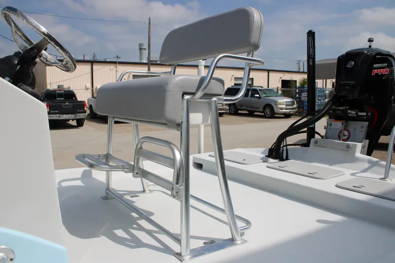 Slide: The Image of 2023 Shoalwater 19' Catamaran with sleek seating and Mercury Pro XS engine. - 7