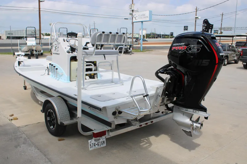 Slide: The Image of 2023 Shoalwater 19' Catamaran with Mercury Pro XS engine on trailer. - 9