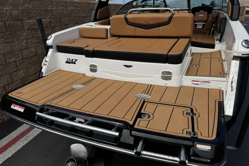 Slide: The Image of 2024 Chaparral 247 SSX boat with spacious rear deck and luxurious seating. - 6