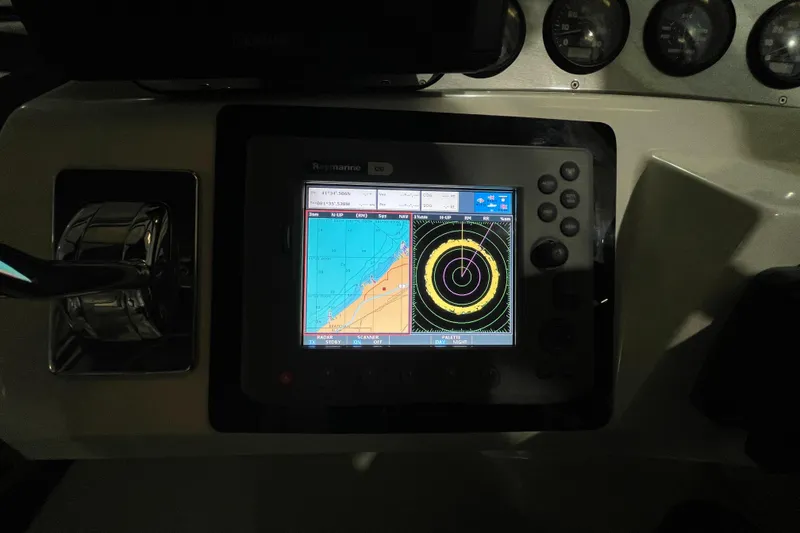 Slide: The Image of Navigation system on 2007 Carver 360 Mariner boat, displaying radar and map interface. - 24