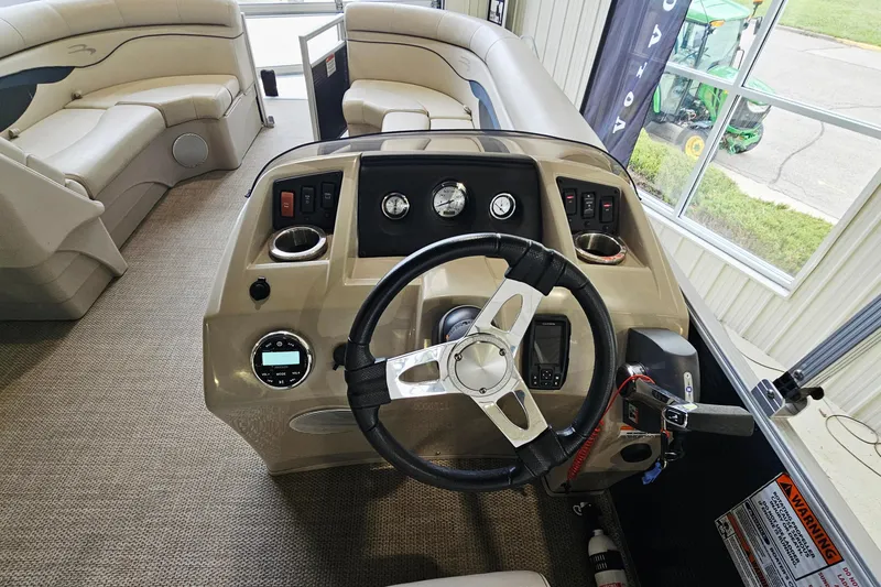 Slide: The Image of Interior view of 2019 Bennington 21 SX Swingback boat with steering console and seating. - 11