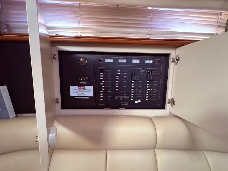 Slide: The Image of Electrical control panel on a 2001 Cruisers Yachts 3870. - 10