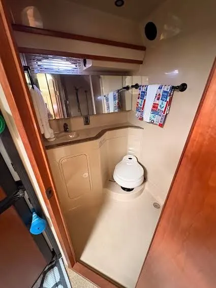 Slide: The Image of Interior of 2001 Cruisers Yachts 3870, bathroom view. - 8