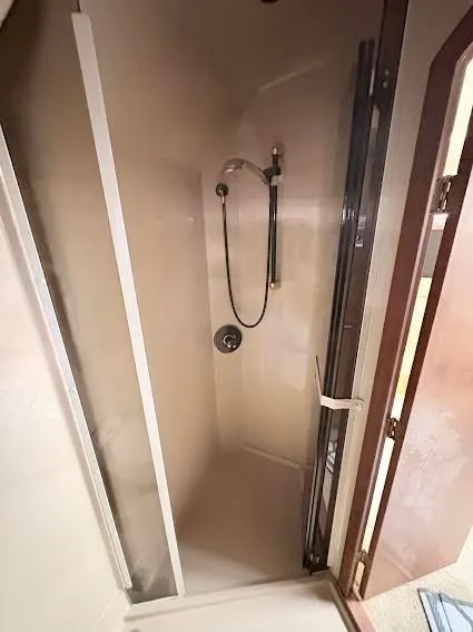 Slide: The Image of Shower in 2001 Cruisers Yachts 3870, compact and modern. - 9
