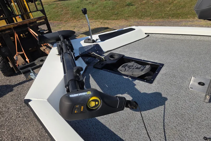 Slide: The Image of 2022 G3 Sportsman 1610 boat deck with trolling motor and pedal controls. - 12