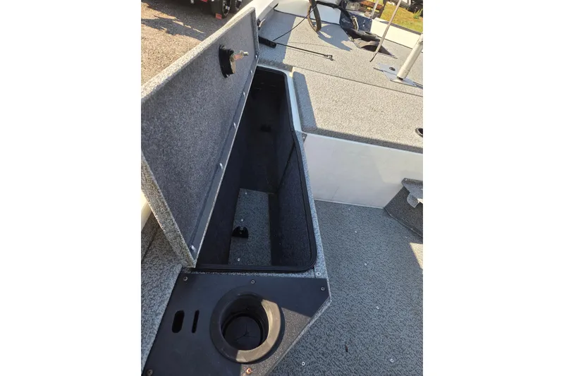 Slide: The Image of 2022 G3 Sportsman 1610 boat interior storage compartment open, showcasing ample space. - 14