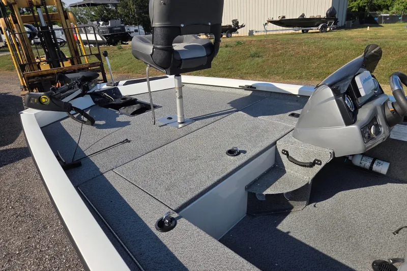 Slide: The Image of 2022 G3 Sportsman 1610 boat interior with steering console and seating. - 15
