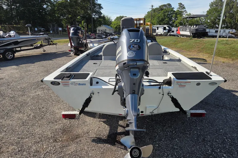 Slide: The Image of 2022 G3 Sportsman 1610 boat with Yamaha 70 engine, parked outdoors. - 5