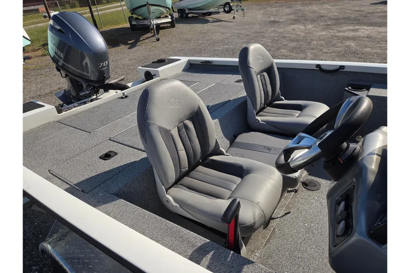 Slide: The Image of 2022 G3 Sportsman 1610 boat interior with steering wheel and Yamaha 70 engine. - 7