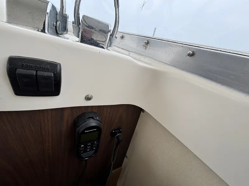 Slide: The Image of Interior view of a 1978 Bertram MOPPIE boat with controls. - 14