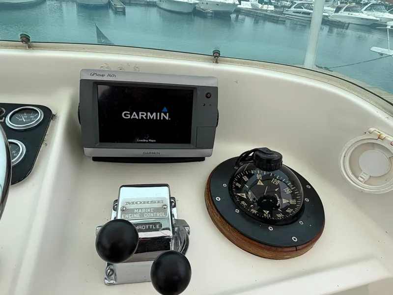 Slide: The Image of Bertram MOPPIE 1978 boat console with Garmin GPS and compass. - 19