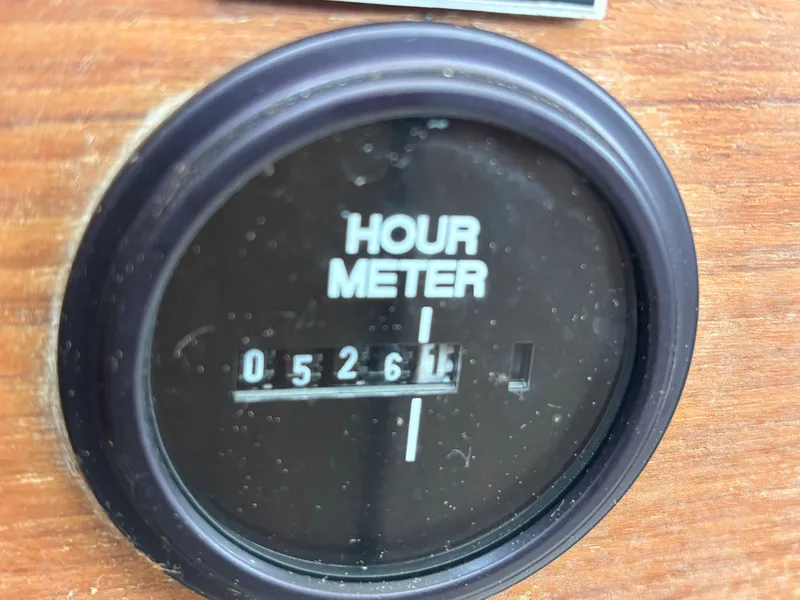 Slide: The Image of Hour meter on 1978 Bertram MOPPIE boat, displaying 526 hours. - 22