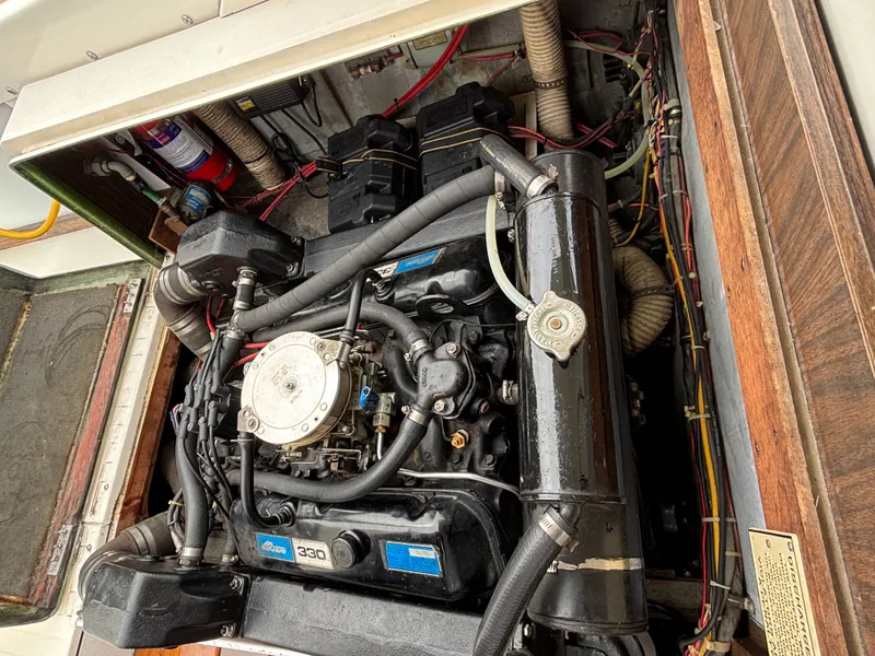 Slide: The Image of Engine compartment of a 1978 Bertram MOPPIE boat with detailed wiring. - 25