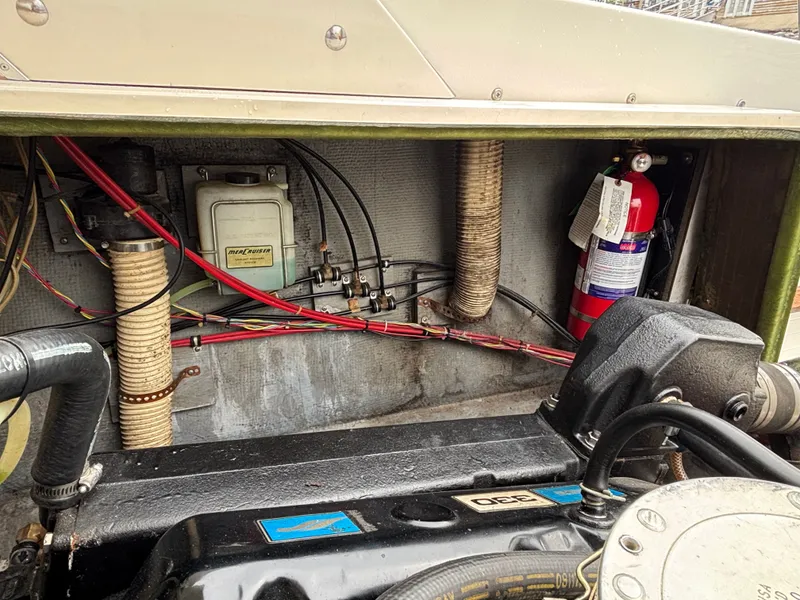 Slide: The Image of Interior view of a 1978 Bertram MOPPIE boat engine compartment. - 28