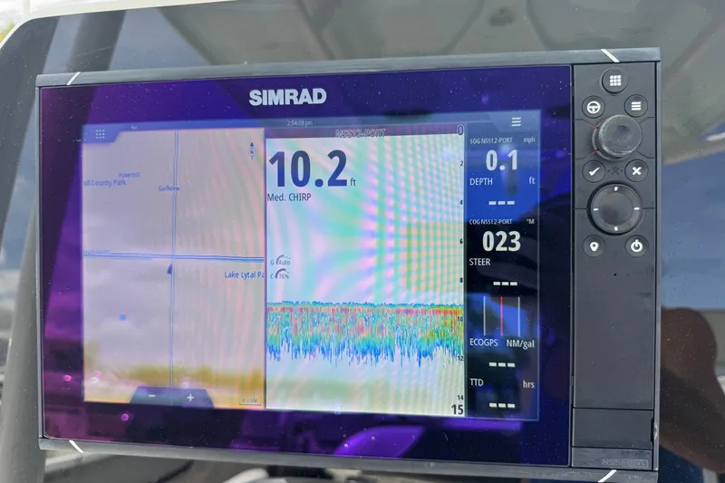 Slide: The Image of Simrad marine display showing depth and navigation data on a 2014 Tidewater 250 CC Adventure. - 10