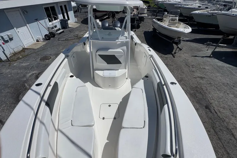 Slide: The Image of 2014 Tidewater 250 CC Adventure boat with spacious seating and sleek design. - 27
