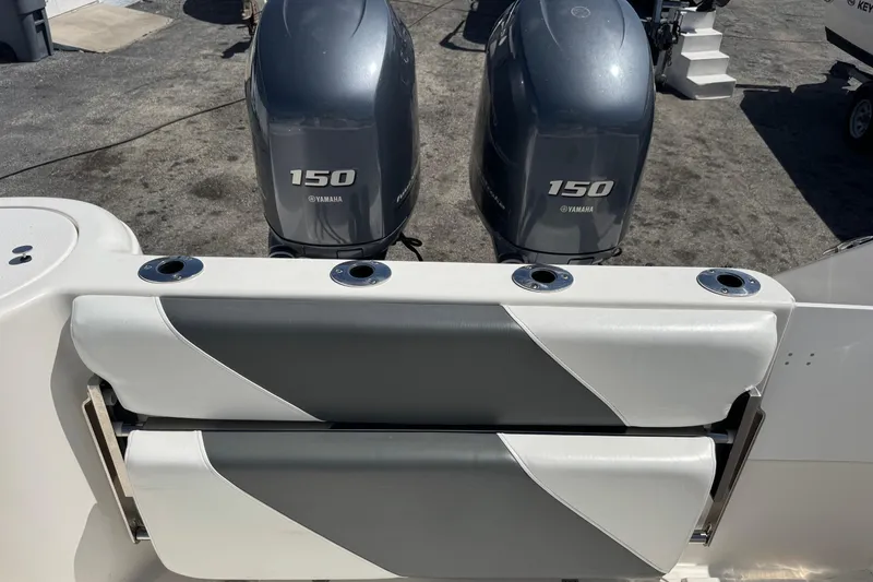 Slide: The Image of 2014 Tidewater 250 CC Adventure boat with twin Yamaha 150 engines. - 37