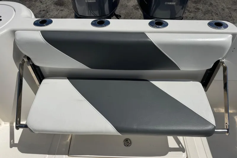 Slide: The Image of Boat seat on 2014 Tidewater 250 CC Adventure, featuring dual Yamaha engines. - 38