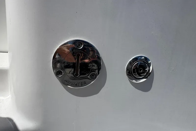 Slide: The Image of Close-up of Tidewater 250 CC Adventure 2014 boat water inlet and cap. - 44