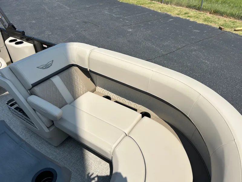 Slide: The Image of The image shows the beige leather seating inside a 2026 Bennington 22 MFB boat. - 29