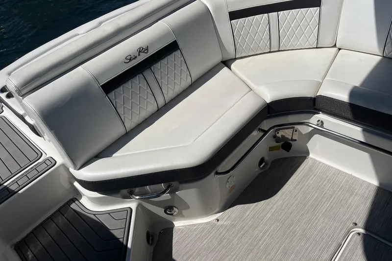 Slide: The Image of Luxurious seating on a 2018 Sea Ray SLX 250 boat with quilted upholstery. - 16