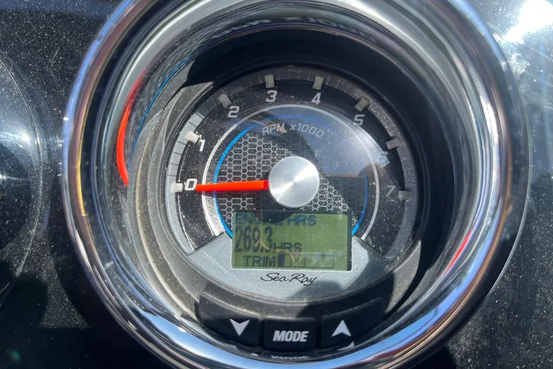 Slide: The Image of Close-up of 2018 Sea Ray SLX 250 tachometer displaying engine hours and RPM. - 28