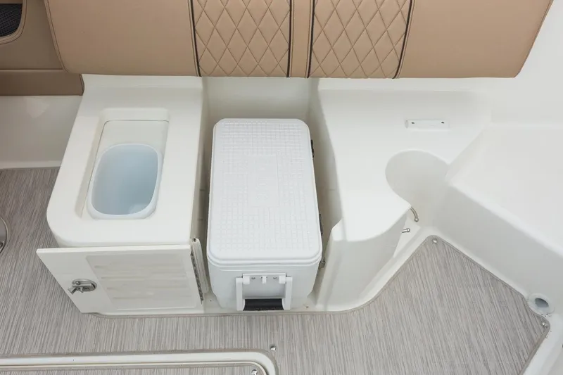 Slide: The Image of Manufacturer Provided Image: 2018 Sea Ray SLX 250 boat interior with cooler and storage compartments. - 9