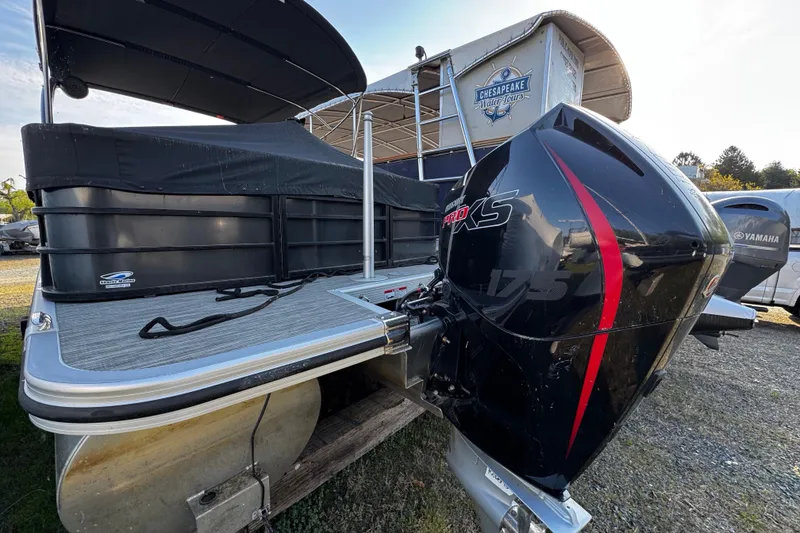 Slide: The Image of 2022 Bennington 24LX pontoon boat with powerful outboard motor, docked at Chesapeake Water Tours. - 10