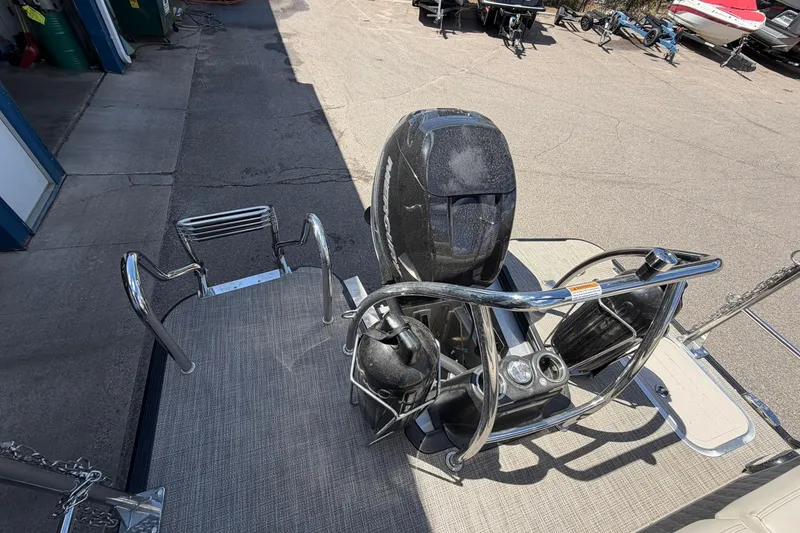 Slide: The Image of 2020 Barletta L25U boat with motor and ladder on deck. - 18