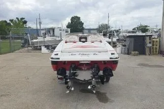 Slide: The Image of 1999 Donzi 28 ZX boat parked outdoors, rear view, New Orleans, Louisiana. - 6