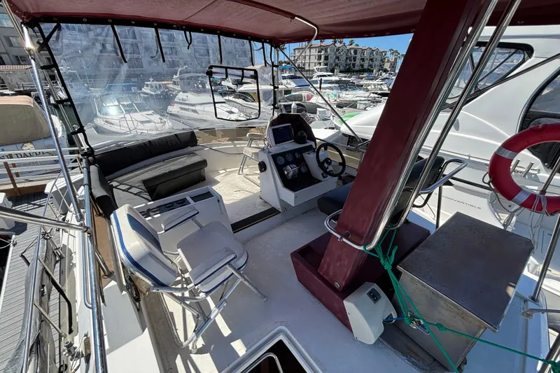 Slide: The Image of Cockpit of a 1984 Posillipo Technema yacht with seating and steering controls. - 14