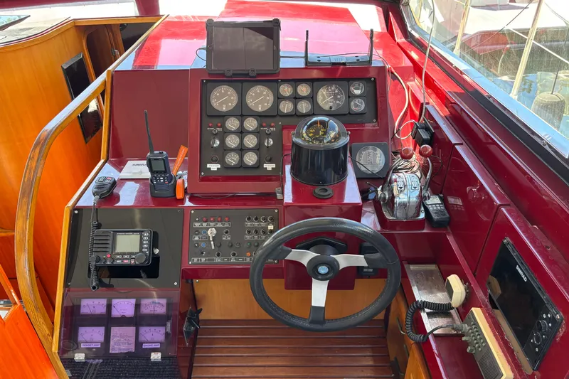 Slide: The Image of Cockpit of a 1984 Posillipo Technema yacht with navigation instruments and controls. - 17