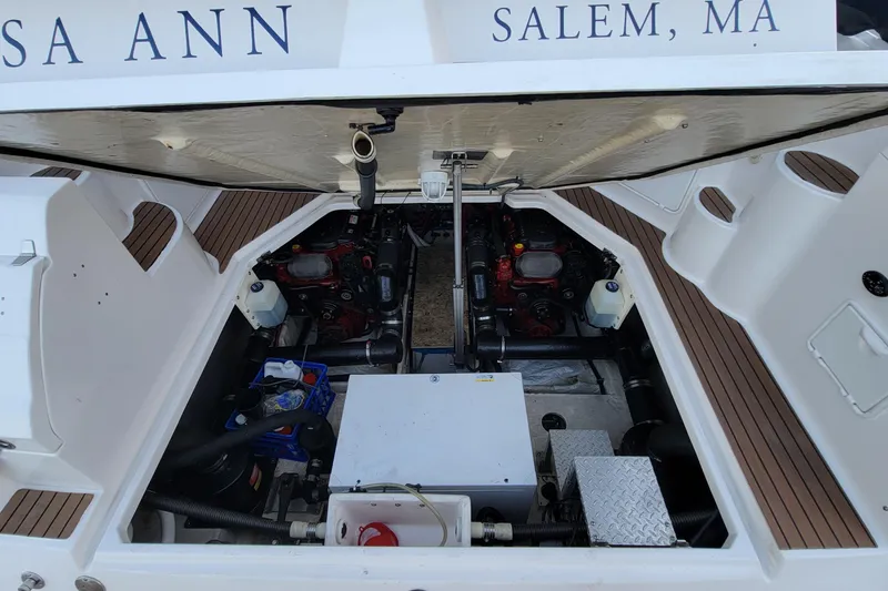 Slide: The Image of Engine compartment of a 2007 Regal Commodore 3760 IB boat, showcasing dual engines. - 29