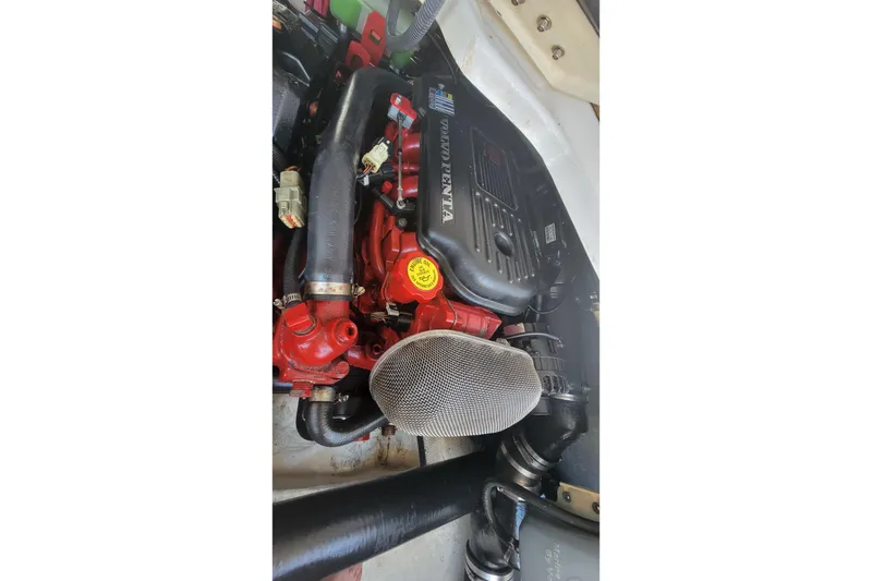 Slide: The Image of Engine compartment of a 2007 Regal Commodore 3760 IB boat, featuring Volvo Penta components. - 31
