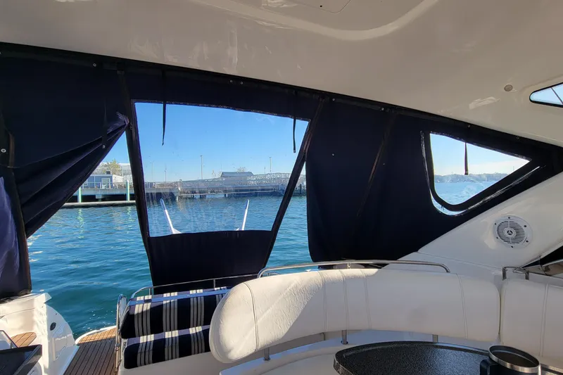 Slide: The Image of Interior view of 2007 Regal Commodore 3760 IB yacht with marina backdrop. - 36