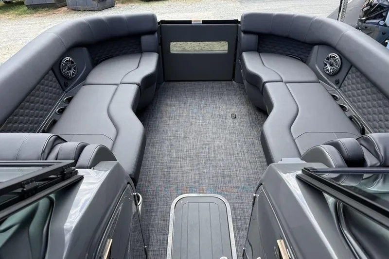 Slide: The Image of Luxurious interior of 2026 Godfrey Sanpan 2700 ULW Twin pontoon boat with plush seating. - 12