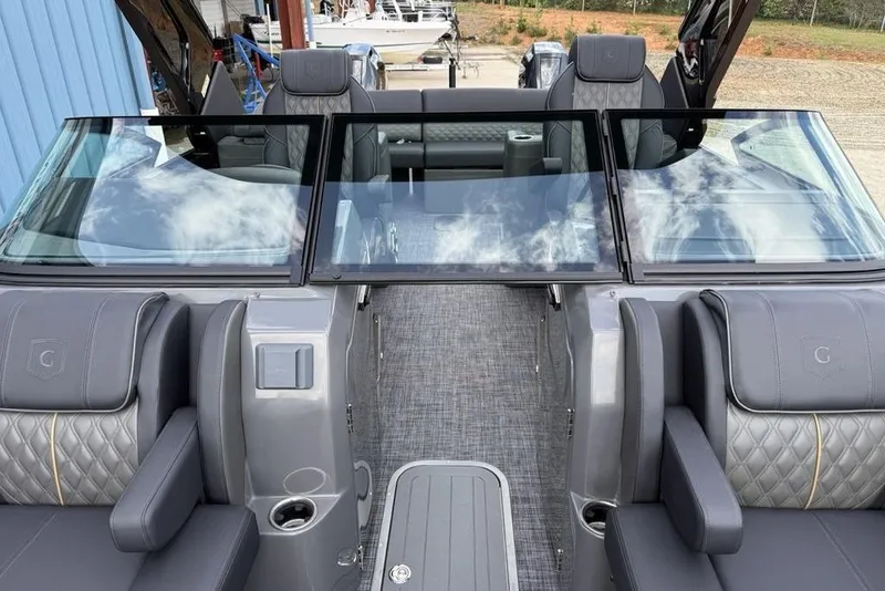 Slide: The Image of Luxurious interior of 2026 Godfrey Sanpan 2700 ULW Twin pontoon boat with plush seating. - 13