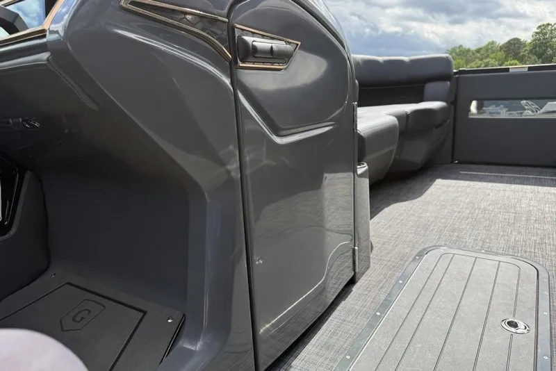 Slide: The Image of Interior of 2026 Godfrey Sanpan 2700 ULW Twin boat, featuring sleek design and seating. - 19