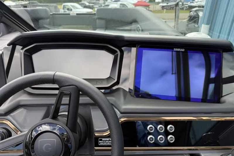 Slide: The Image of Steering console of 2026 Godfrey Sanpan 2700 ULW Twin with Simrad display. - 34
