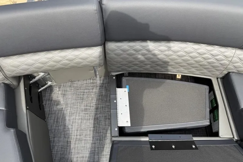 Slide: The Image of 2026 Godfrey Sanpan 2700 ULW Twin boat interior with quilted seating and storage compartment. - 36