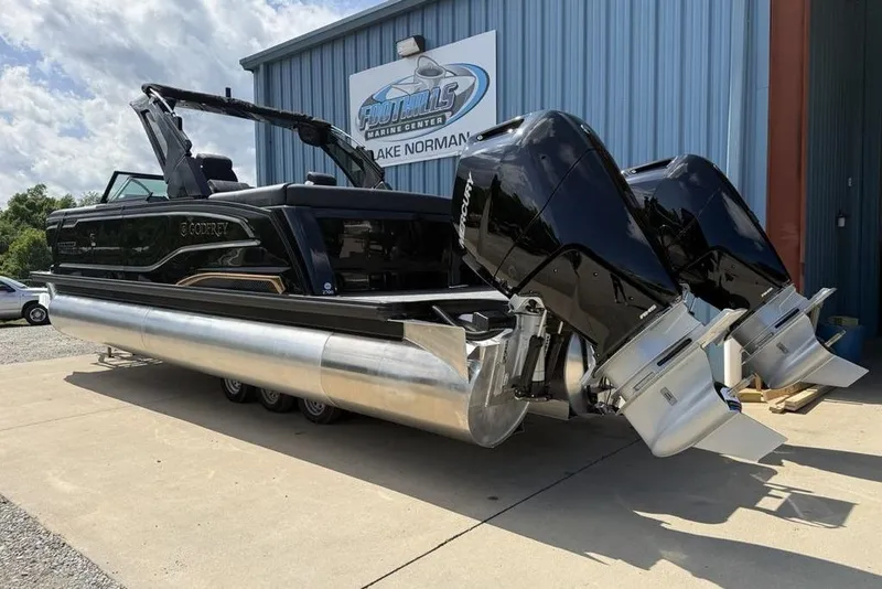 Slide: The Image of 2026 Godfrey Sanpan 2700 ULW Twin pontoon boat with dual Mercury engines. - 5