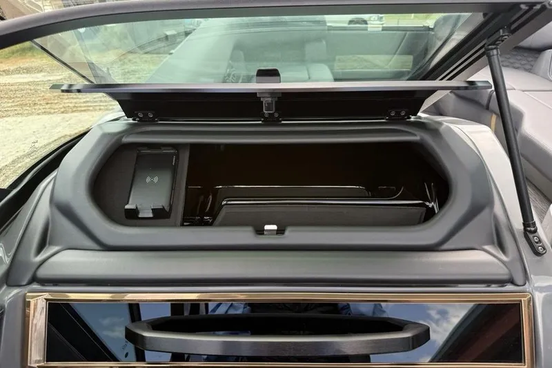 Slide: The Image of Open storage compartment in 2026 Godfrey Sanpan 2700 ULW Twin boat. - 51